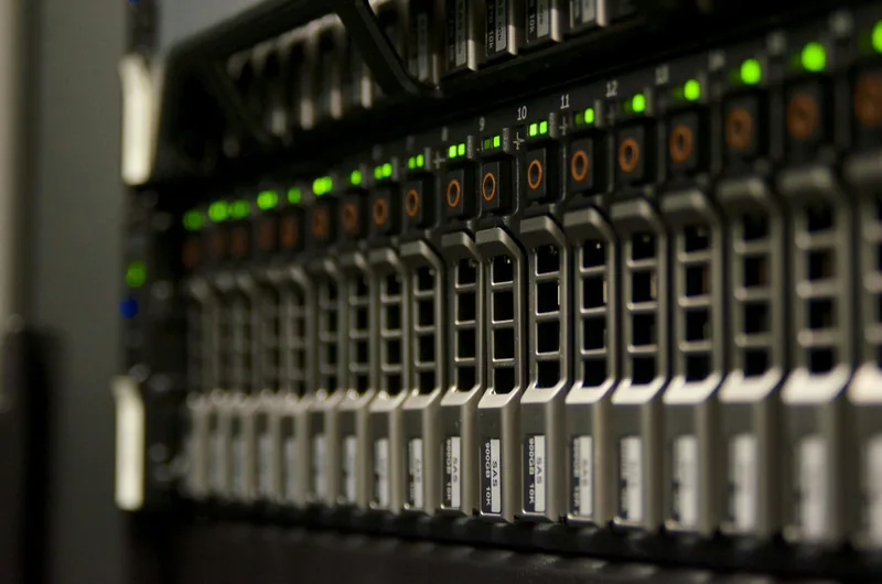 Server rack with blinking green status lights