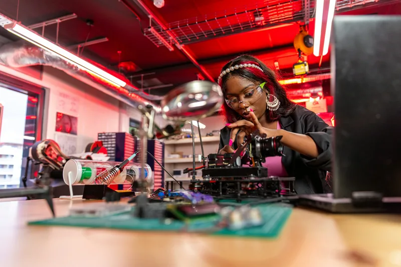 Woman working on a project in a lab